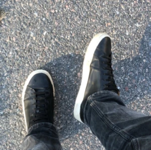 Louboutin  - Svart vita Louboutin skor 