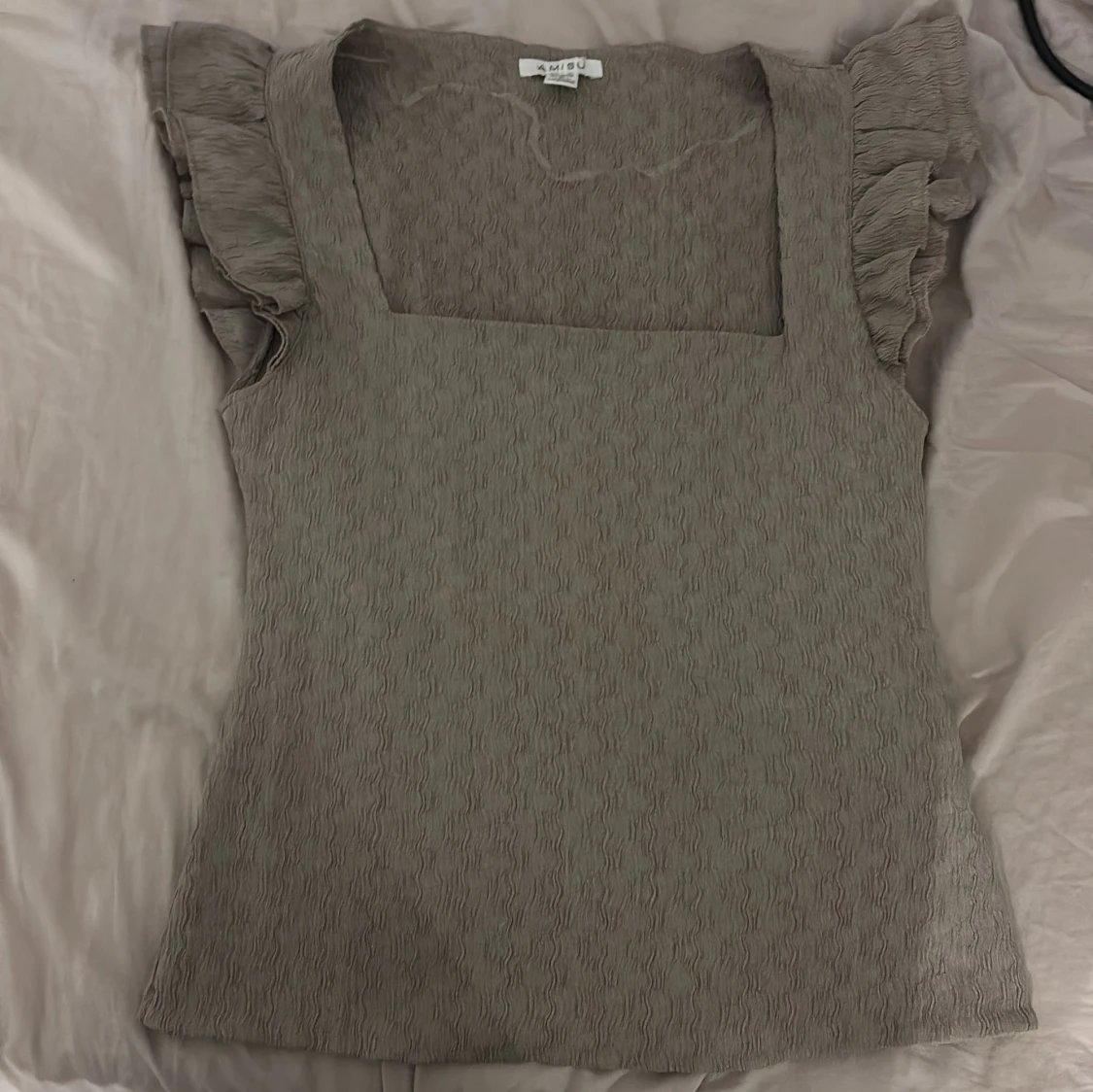 Beige topp från Amisu