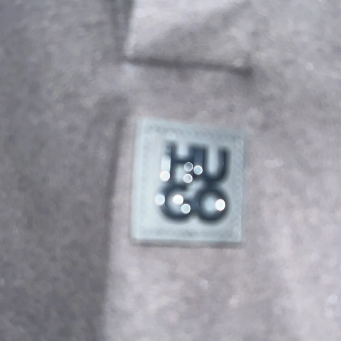 Svart kortärmad piké från Hugo - 91