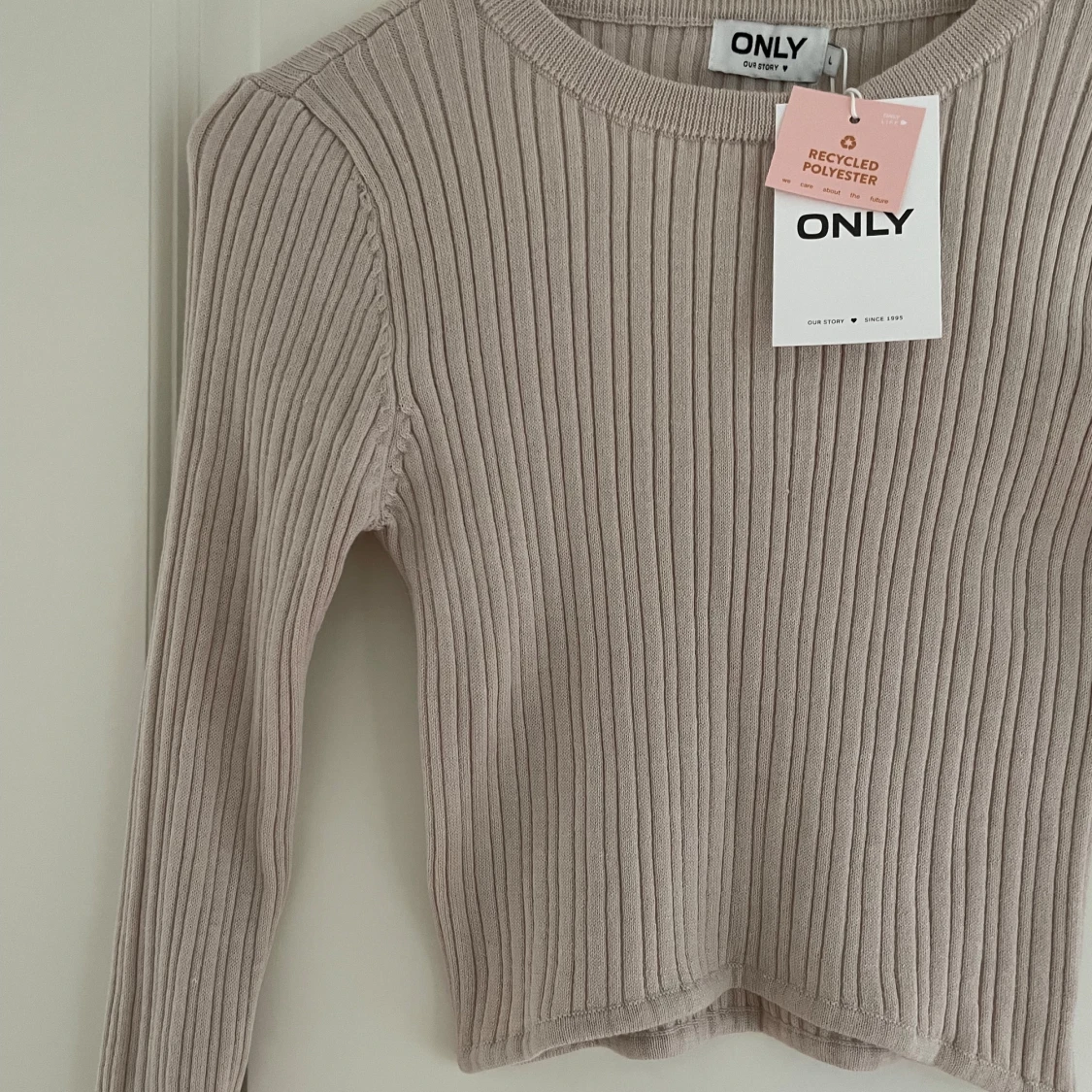 Ribbstickad topp M/L - 93