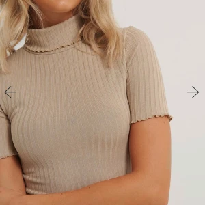 Topp - Nyskick aldrig använt och prislappen finns kvar