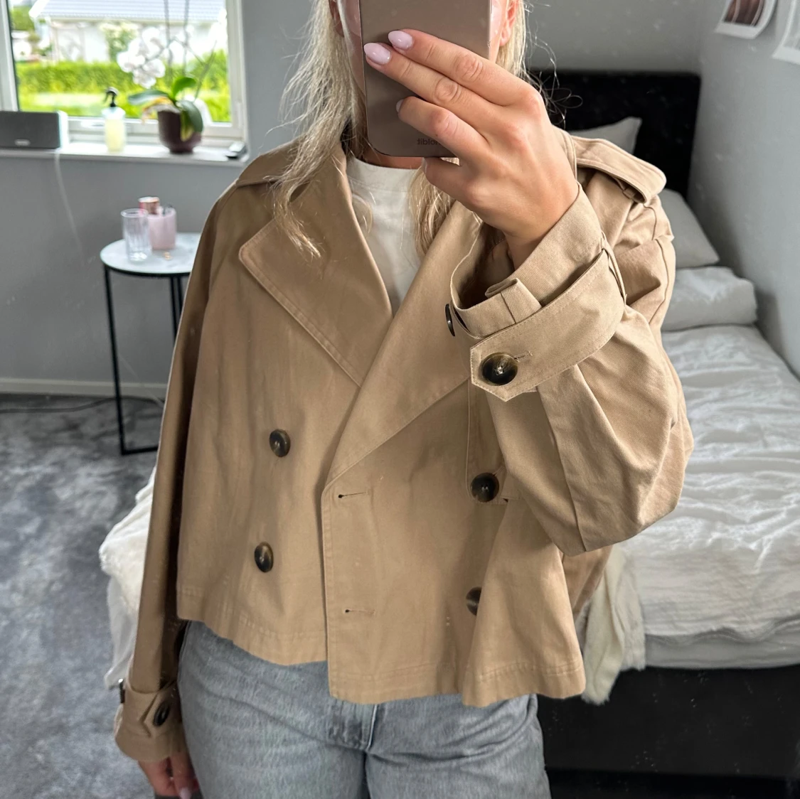 Beige trenchcoat 