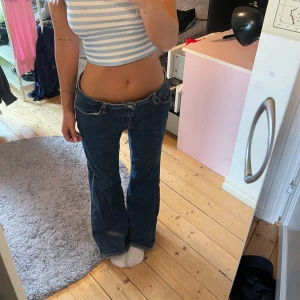 Lågmidjade Tommy jeans  - Lågmidjade blå jeans från Tommy hilfiger