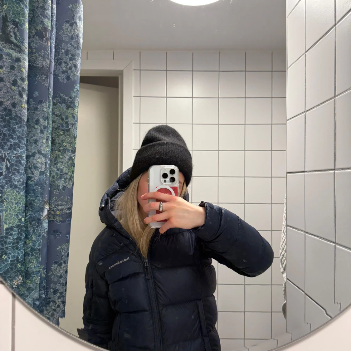 Mörkblå dunjacka från Peak Performance