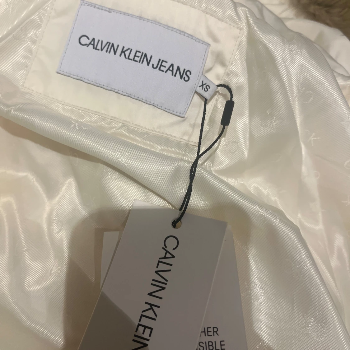 Vit dunjacka från Calvin Klein Jeans - 91