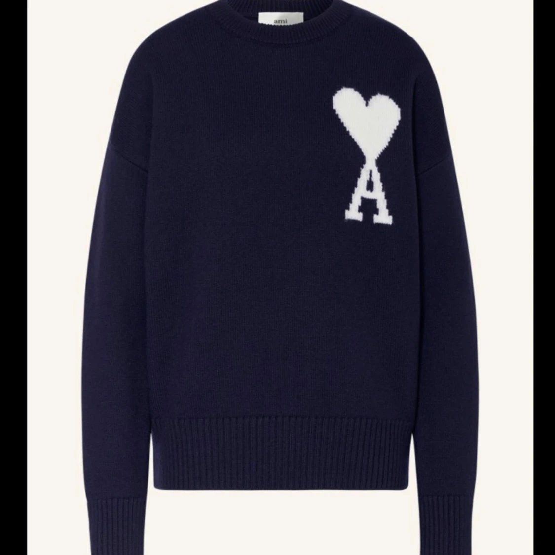 Mörkblå stickad tröja från Ami