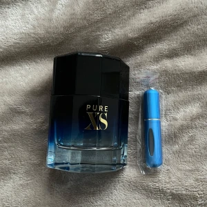 Pacora Banne Pure XS parfym,sample  - 5ml Paco Rabanne Pure XS i parfymbehållare, kan komma i en annan färg än blå