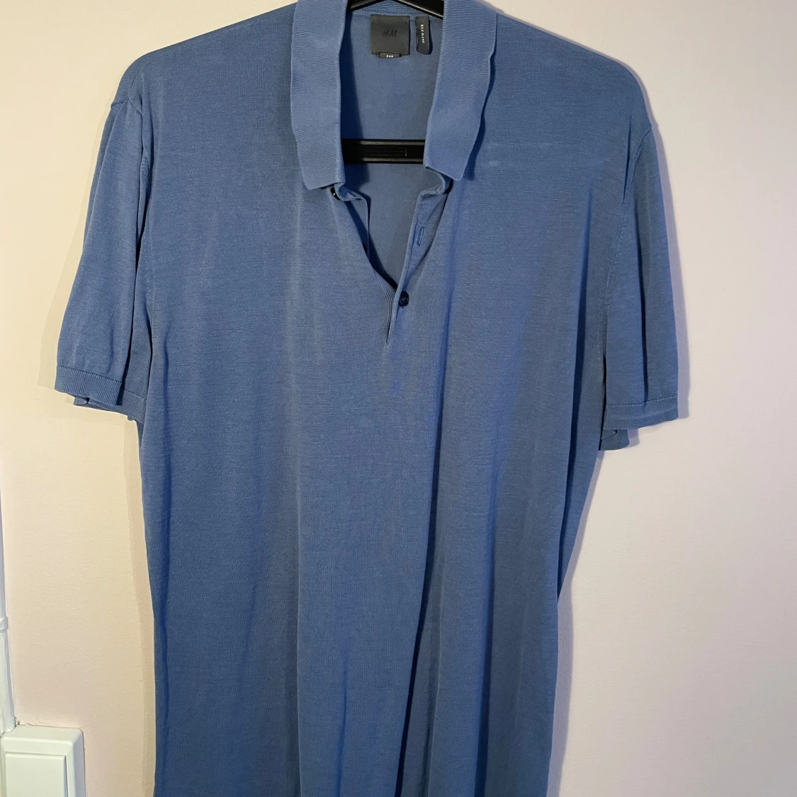 Blå pikétröja från H&M