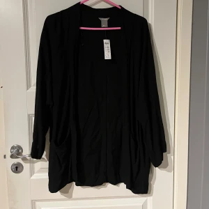 Kofta/ nattkofta - En kofta som är lite genomskinlig. Ny med prislapp kvar