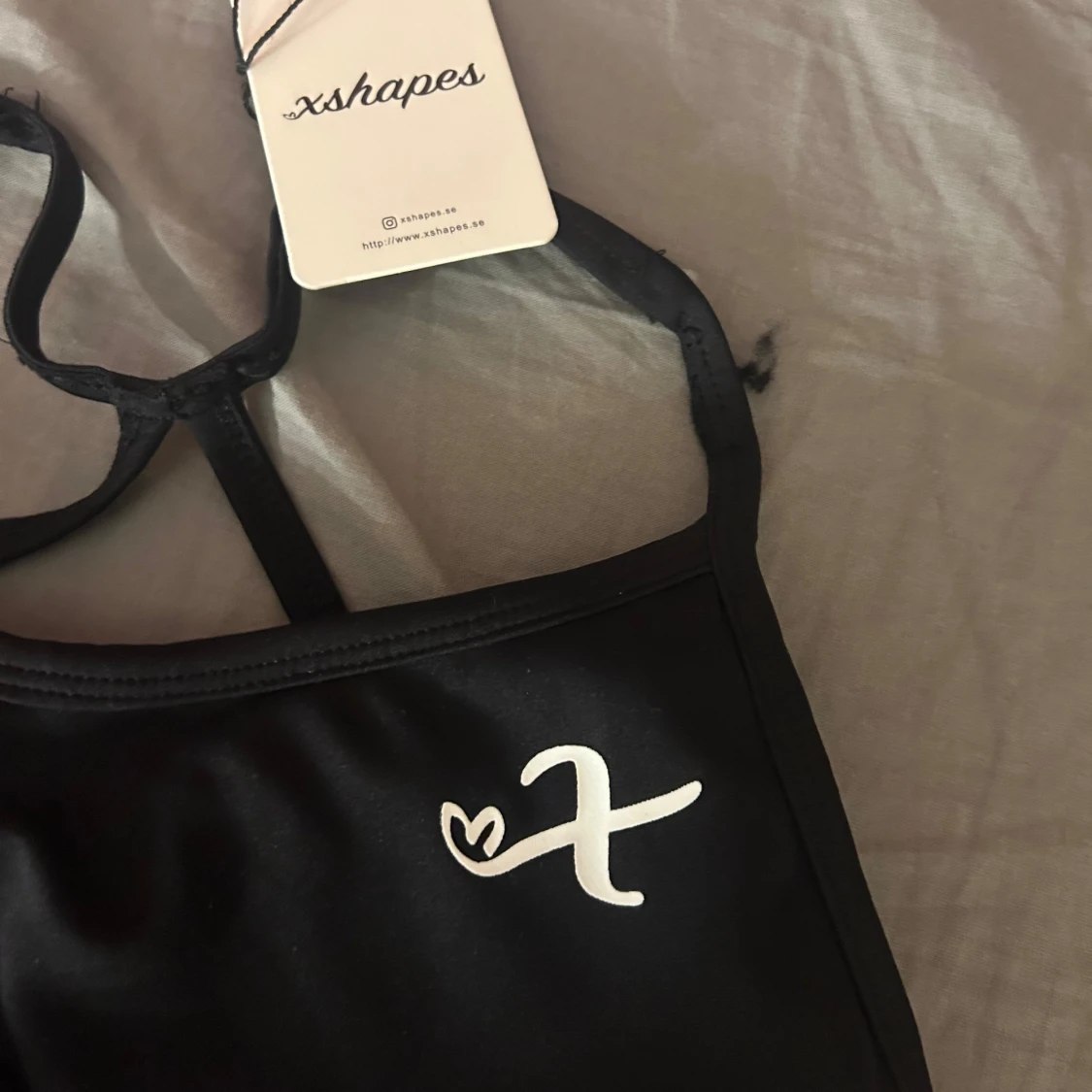 Svart sporttopp från xshapes - 2
