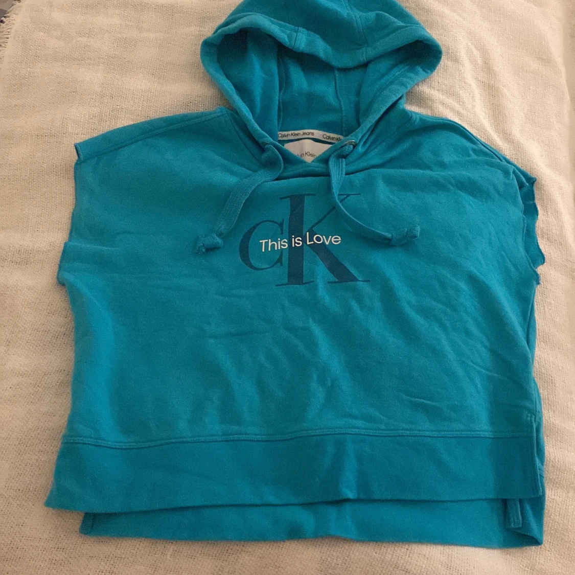 Turkos hoodie från Calvin Klein Jeans