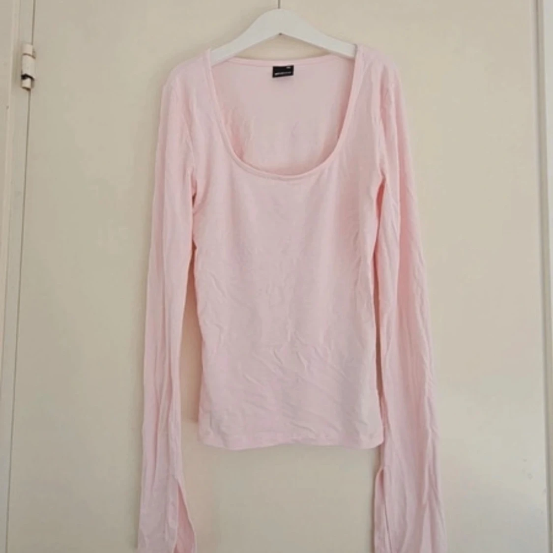 Ljusrosa långärmad topp från Gina Tricot