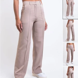 Kostymbyxor  - Säljer kostymbyxor från madlady i sally beige. Högmidjade med raka ben i stråveck. Stl 40 tall💕 köpte för 599