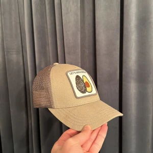 Grön keps med logga - Säljer nu denna snygga keps från cocowi! No size 