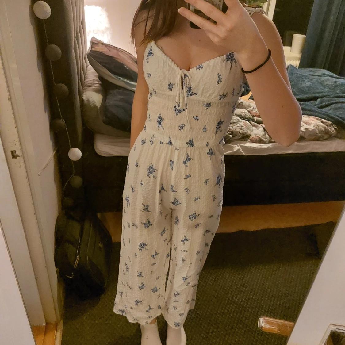 Vit blommig jumpsuit