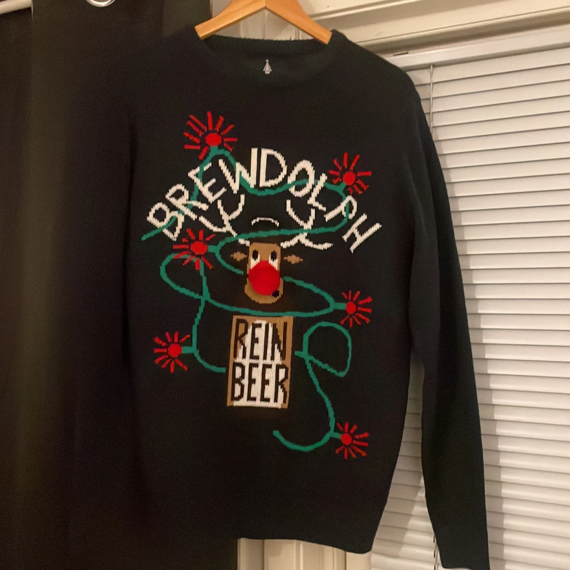 Svart jultröja med renmotiv