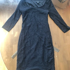 En svart klänning - En svart klänning