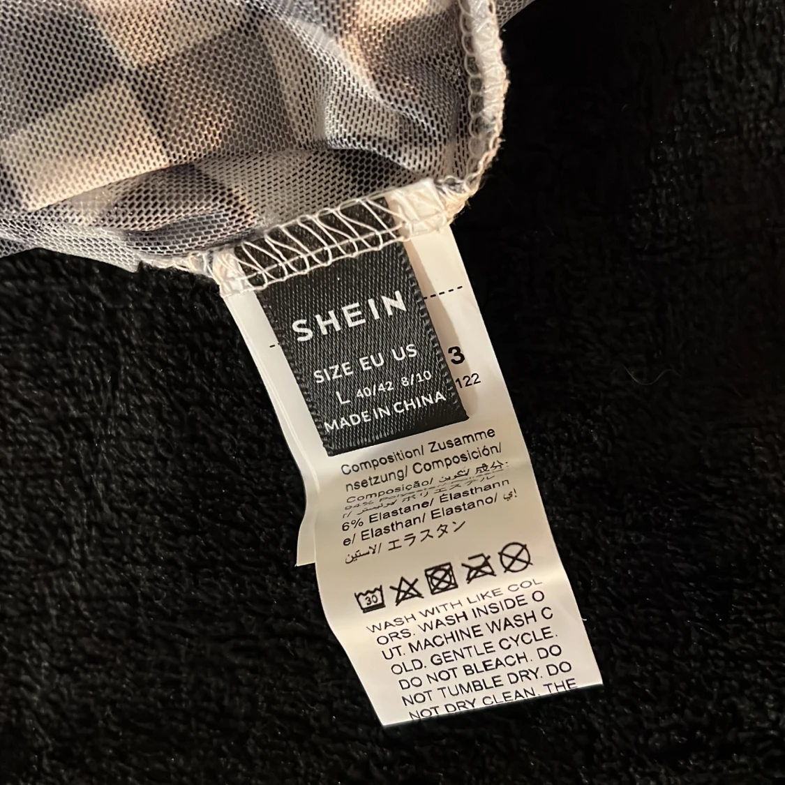 Svartvit rutig polo body från Shein - 92