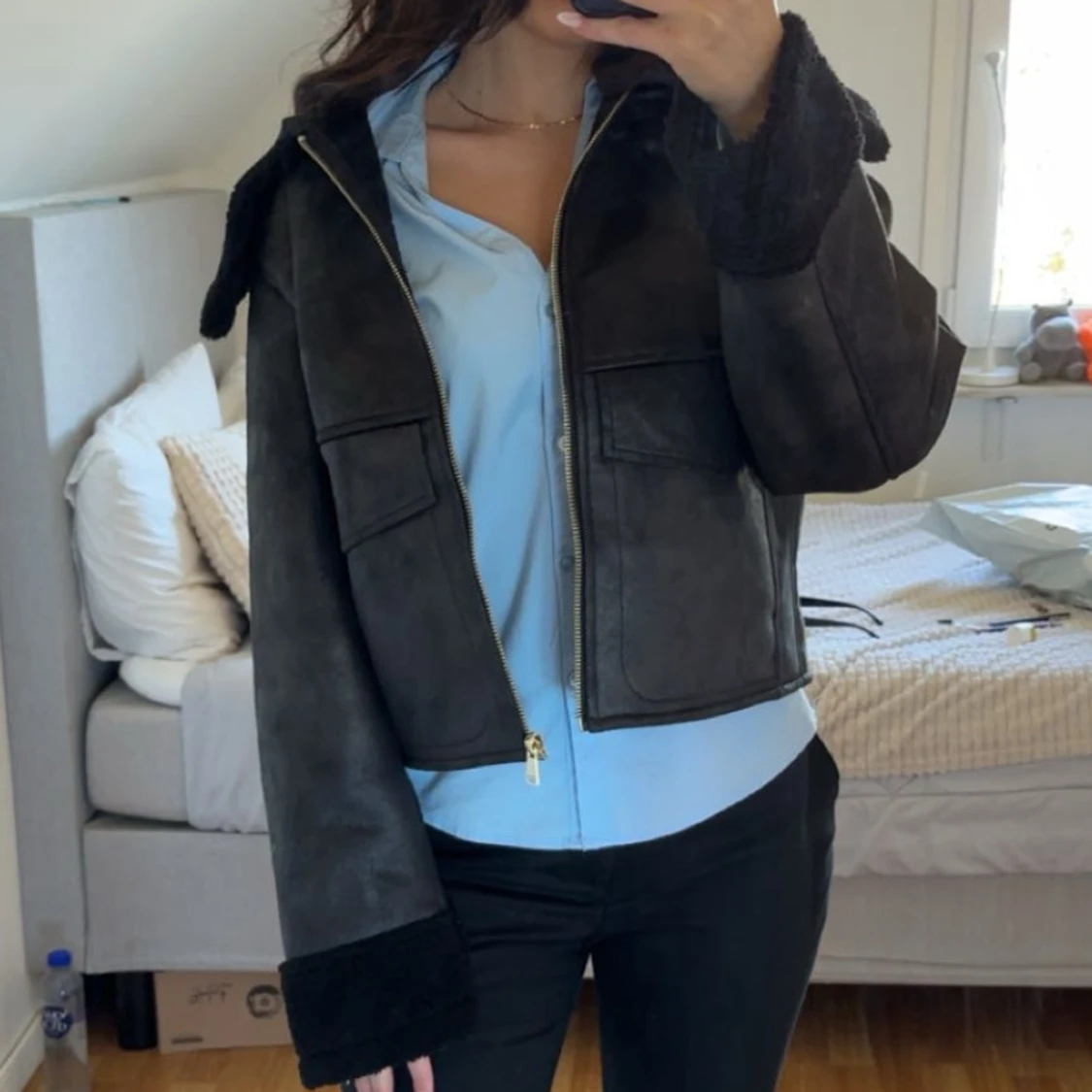 Svart jacka med foder