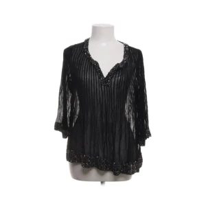 Topp med paljetter  - snygg blus från hunkdory i storlek s. den har ett litet hål på ena axeln (bild 4). använd ”köp nu”