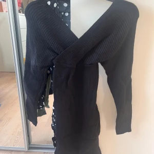 Stickad klänning  - Stickad klänning 