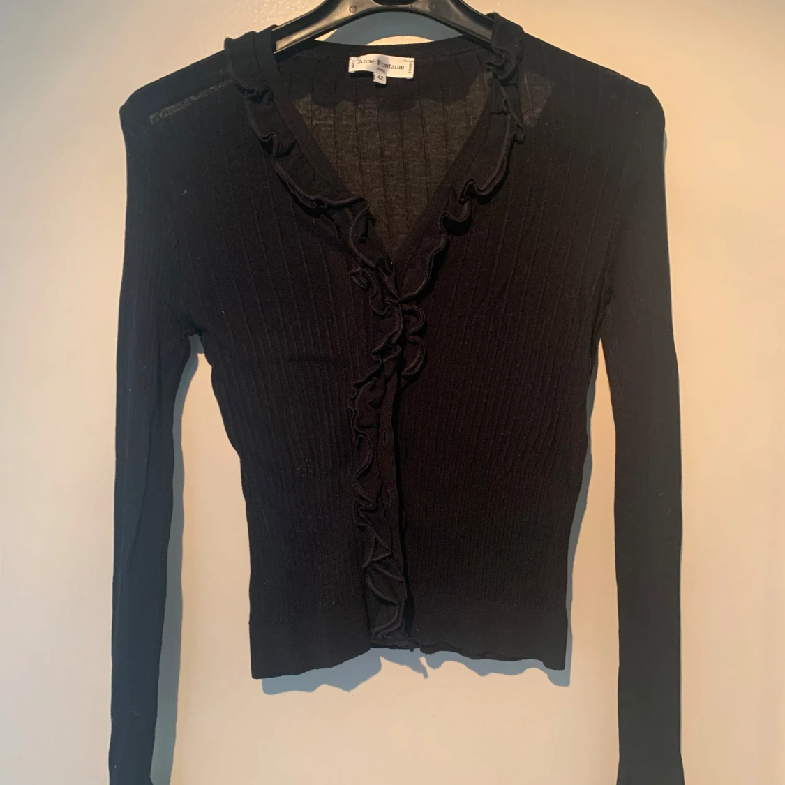 Svart ribbad kofta från Anne Fontaine