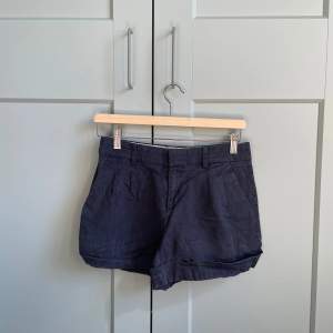 Washed Navy Woven Shorts with Cuffed Hem  Lyocell, Cotton, & Linen blend  Tagged Size 4