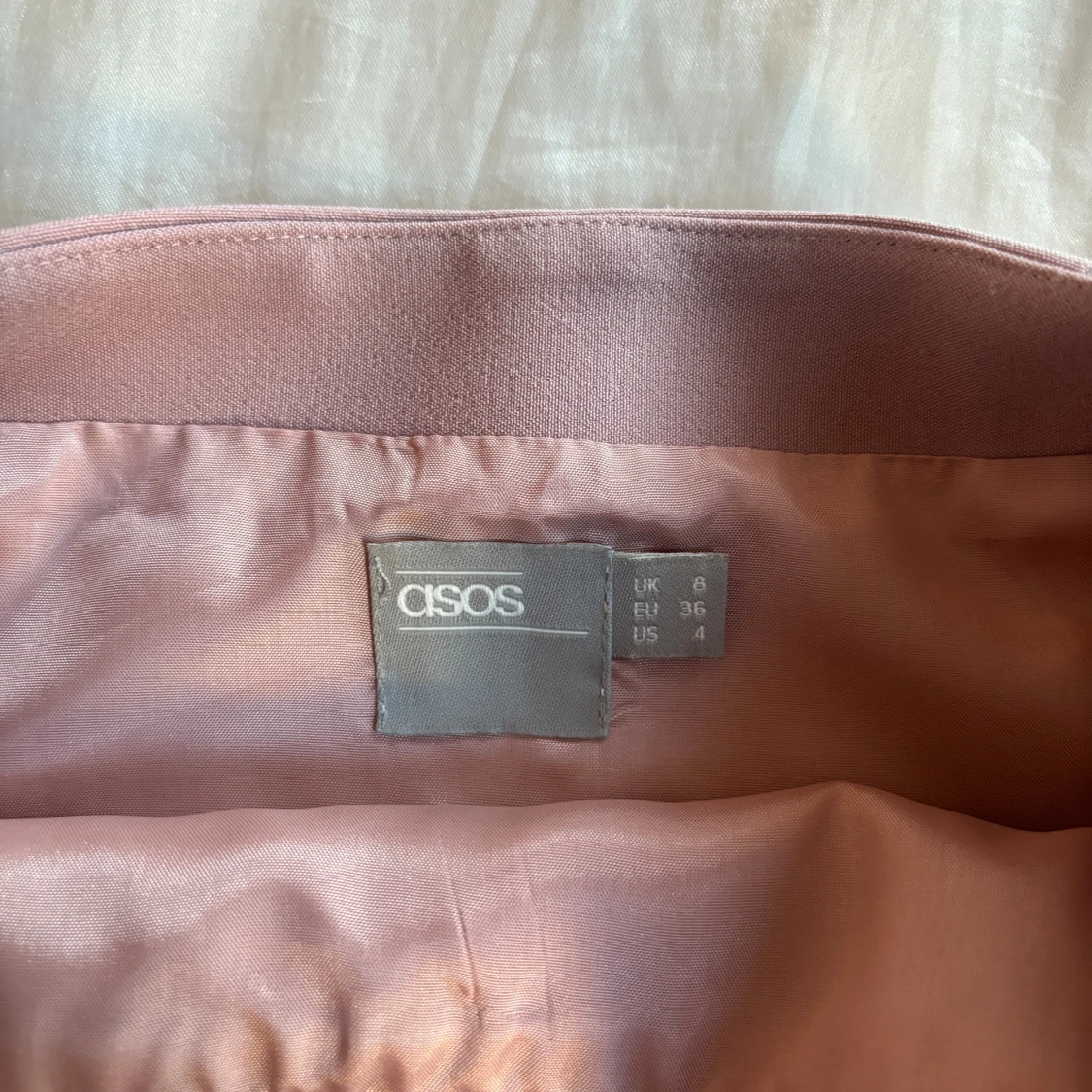 Rosa minikjol med knappar  - 91