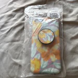 iPhone 7/6 blommig skal - Den passar till iPhone 7/6. Den är rent och färgglada. Det finns knapp på skalen.