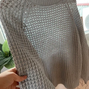 Stickad tröja  - En jättesöt ljusblå stickad tröja ifrån lager 157. Säljer då jag bara använt fåtal gånger. 