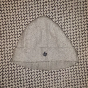 Morris~mössa - Knappt använd, men samlar på sig ludd