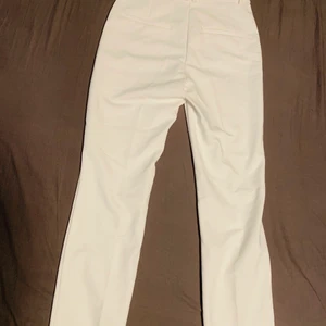 Kostymbyxor  - Vita kostymbyxor storlek 34/S/XS aldrig använda 