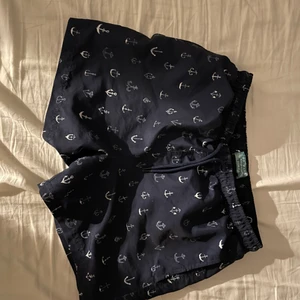 Badbyxor - Badbyxor från primemark i storleken XS. Marinblå med vita ankare på. Knappt använda! (Nät inuti!)