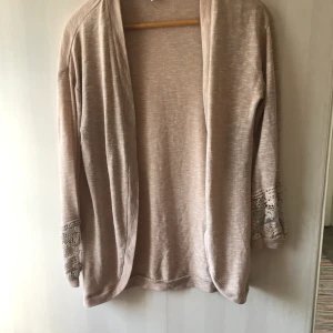 Kofta - Ytterst lite nopprig annars fint skick 