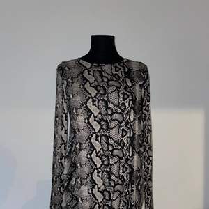 Leopard tunika/klänning från Gina Tricot Strl M