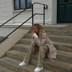 Beige kappa  - Snygg beige kappa 