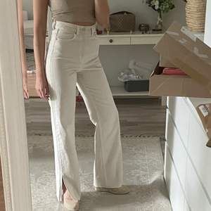 Beige zara denim pants. Wide leg with opening. Used once. Like New