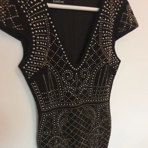 klänning  - Bebe klänning storlek 34/36 i jätte bra skick 