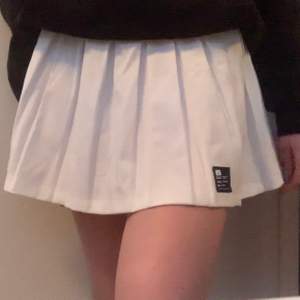 White tennis skirt from Bershka. New with tags. Original price is 250kr.