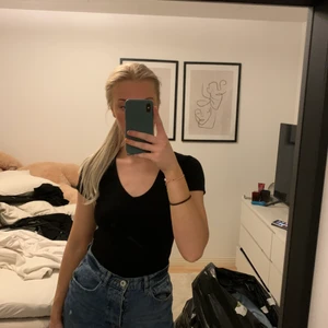 Svart body - Svart body från lager 157 , knappt använd, storlek S , sitter bra mot kroppen och stretchig 