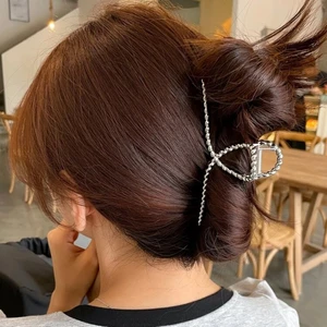 Hårklämma - Säljer en oanvänd hårklämma som ligger kvar i förpackning.