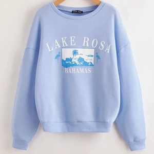 Blå tröja - Ljus blå sommrig tröja med vitt tryck