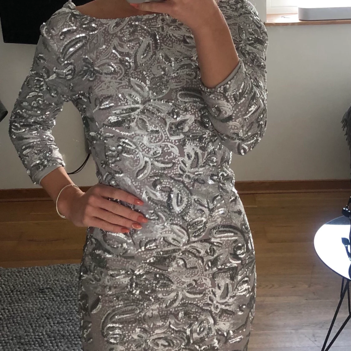 Glittrig silverklänning 