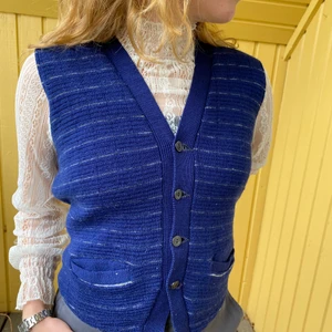 Blue knitted pull over  - Soft fabric in perfect condition 