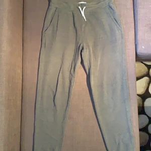 Dark green sweatpants - Loose fit and soft material. Great for relaxing. Worn for two weeks 
