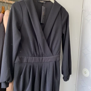 Elegant klänning  - En elegant lång svart klänning, storlek 42