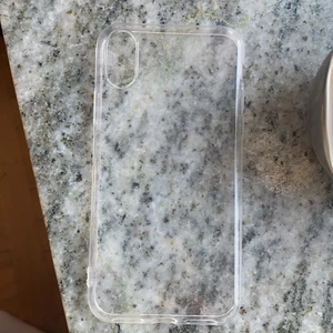 iPhone skal Modell x  - Det är ett skal som är gummi aktikt och lätt att ta av aldrig använd 