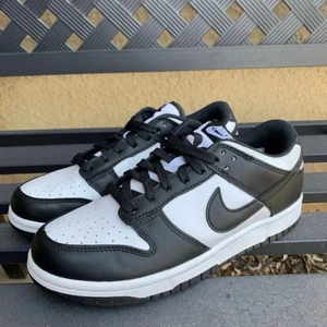 Nike Panda Black White Low Dunks - Like new. Small creases. Authentic and in good condition. Size 8 in women. Open to reasonable offers!