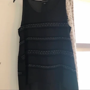 Rock and republic  - In great condition, never worn, fits comfortably no flaws. Sleeveless black top. 