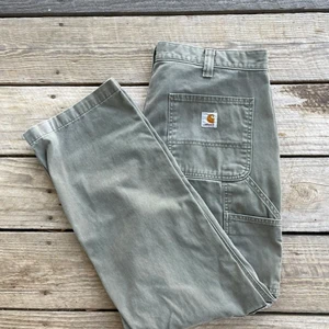 Carhartt - Vintage Faded Green Carhartt Relaxed Fit Pants  Size: US 36 / EU 52  Color: Green  Condition: Used